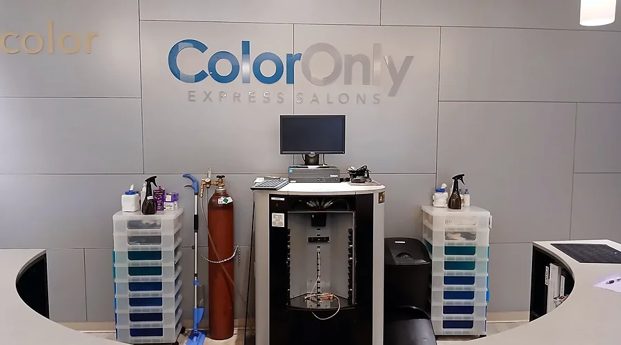 Reception desk at a ColorOnly Express Salon