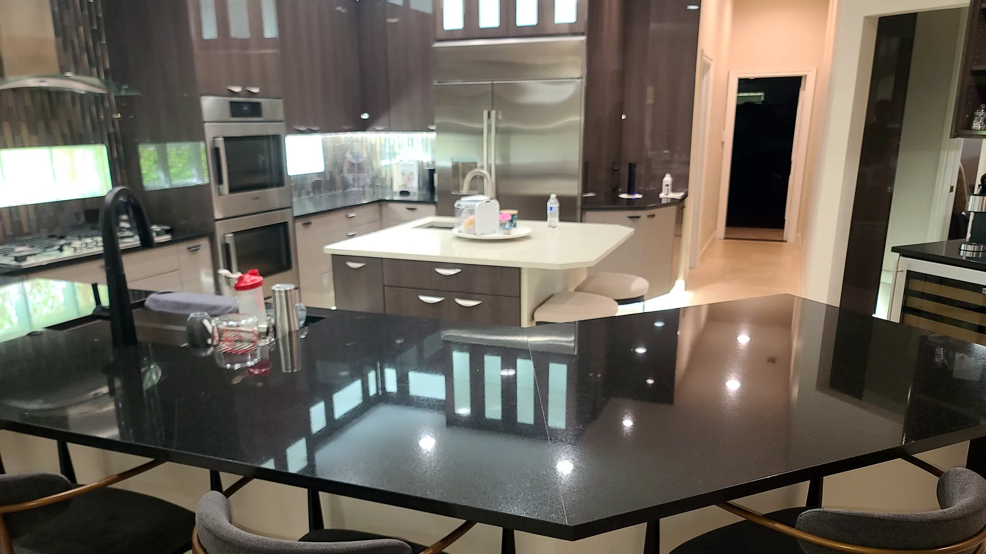 Modern kitchen with recessed and under-cabinet lighting