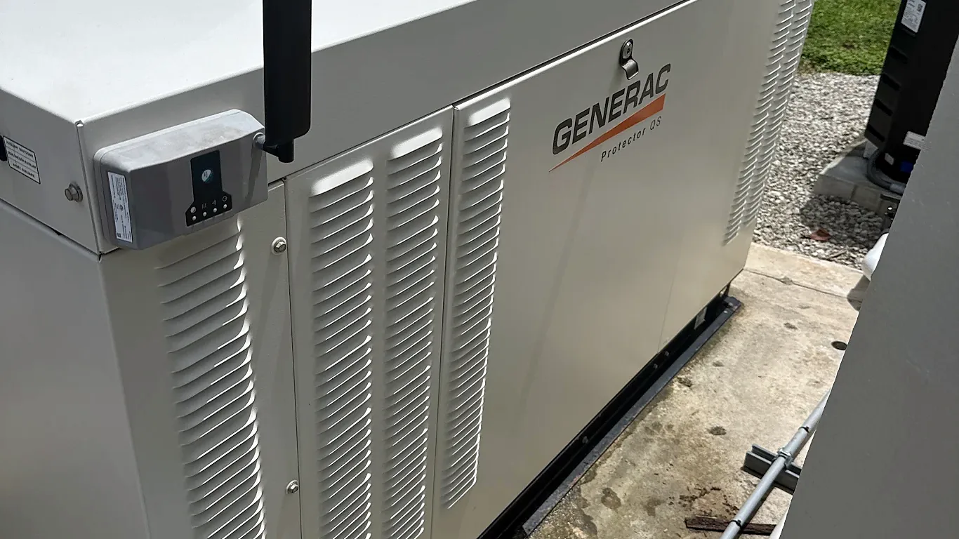 Large liquid-cooled Generac Protector standby generator with its fuel and electrical connections