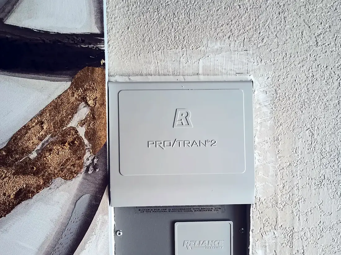 Reliance Pro/Tran 2 manual transfer switch and power inlet mounted on an exterior wall