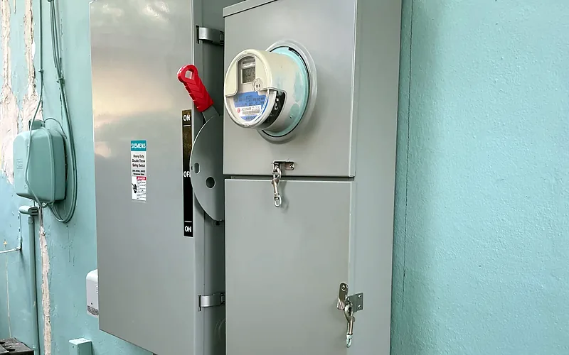 Meter and generator transfer switch on the outside wall of a Pembroke Pines home
